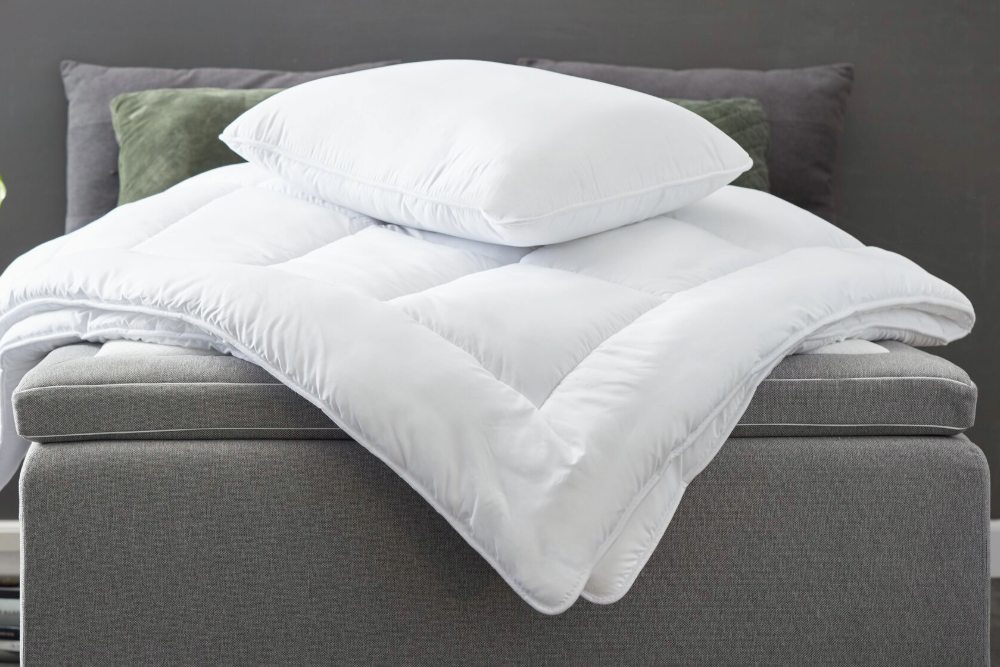 Do -70% na izbrane preš. odeje in vzglavnike